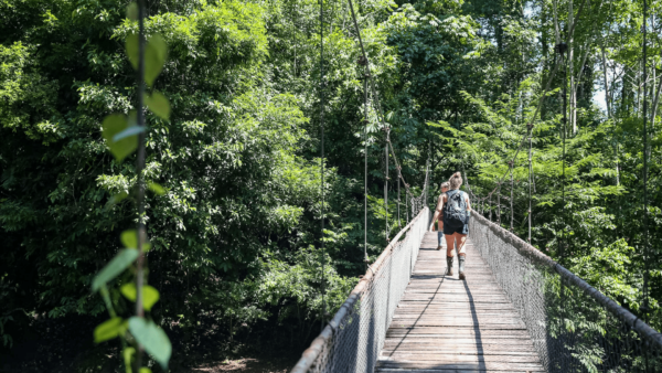 walking across a bridge in Costa Rica