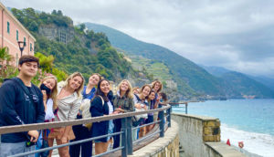 Students in front of the sea in Cinque Terre.