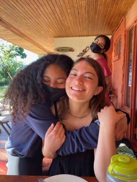 Students hugging in Costa Rica