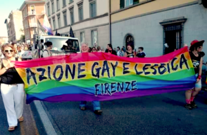 Members of LGBTQ+ Association hold pride flag in Florence, Italy