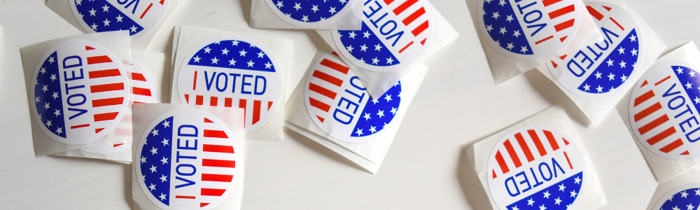 "I Voted" stickers with American flags. Did you know that you can vote while abroad with an absentee ballot?!