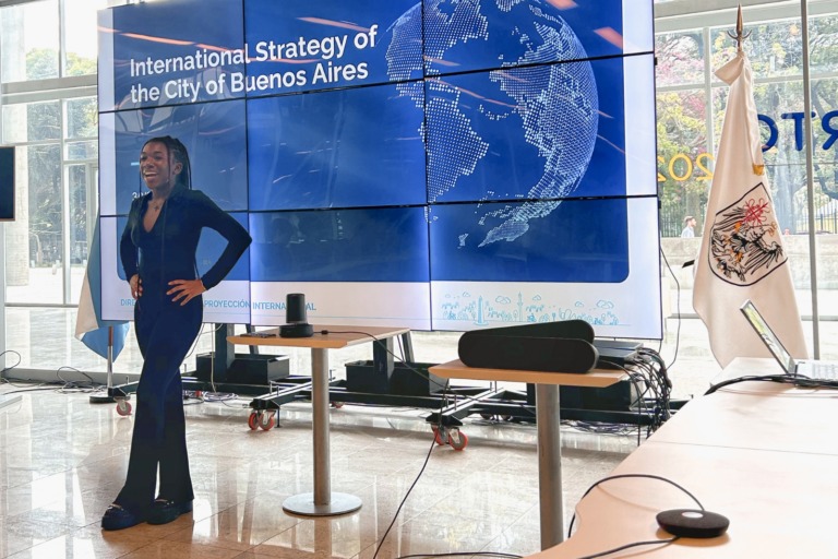 A Verto student giving a presentation at a government building for the city of Buenos Aires.